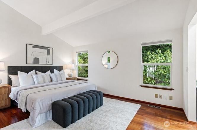 Primary bedroom staged by Top Staging And Design at a home in Bellevue